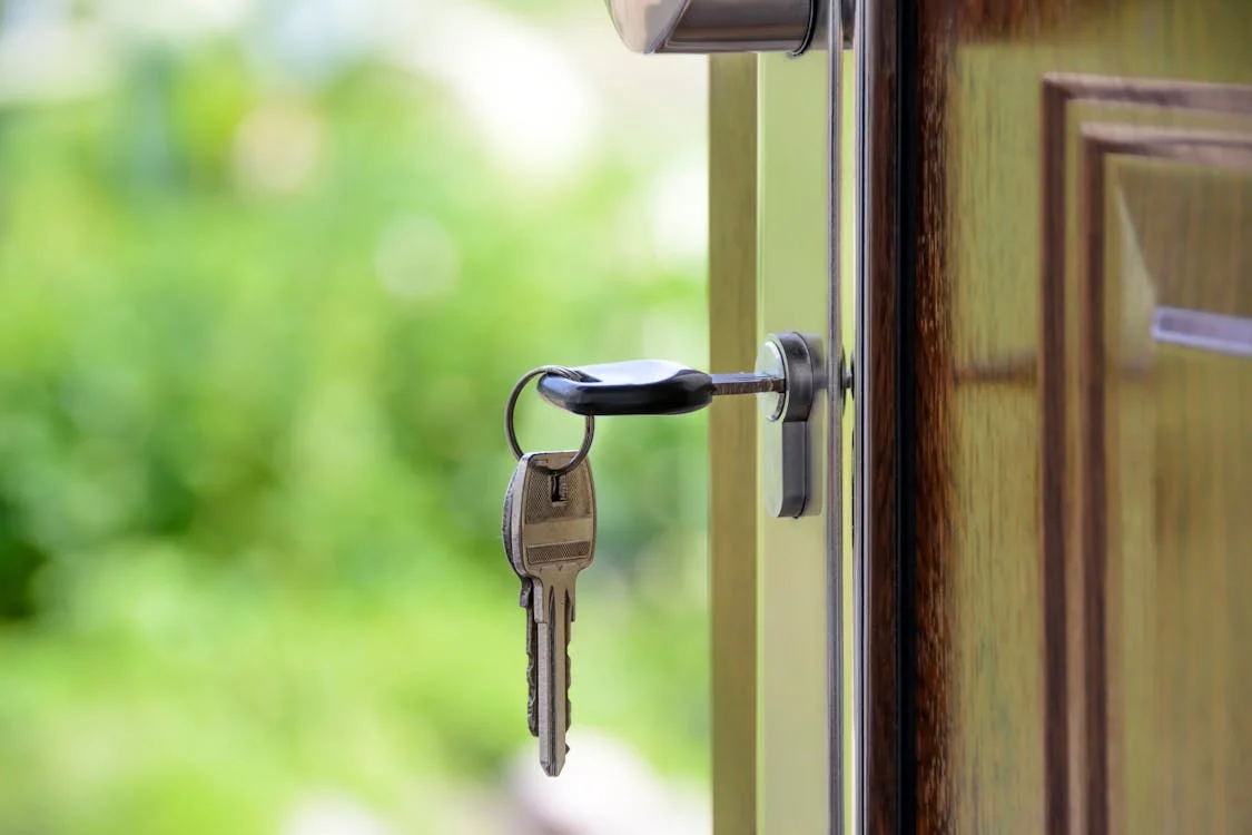 Open door with key in lock